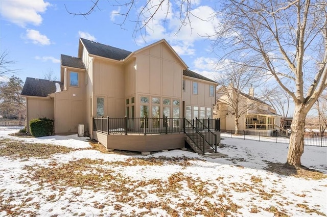 view of snow covered property