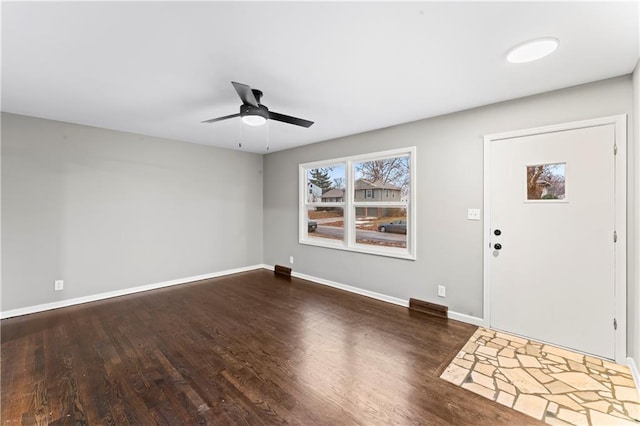 entrance foyer with ceiling fan and dark hardwood / wood-style flooring