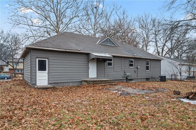 back of property with central air condition unit