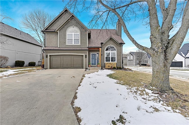 front of property featuring a garage