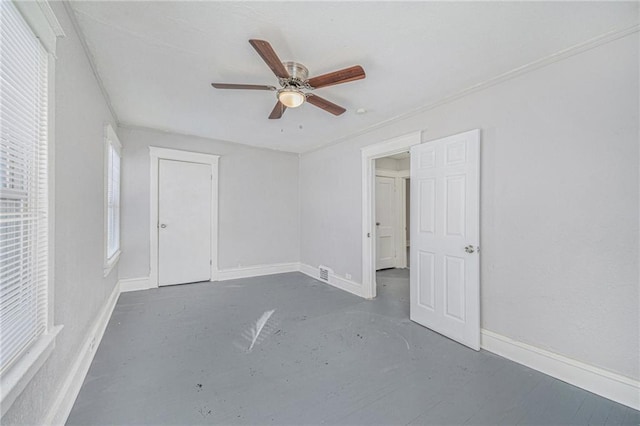 unfurnished bedroom featuring ceiling fan