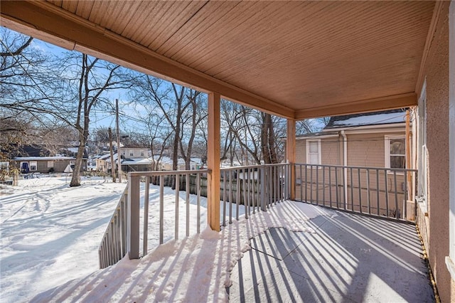 view of snow covered deck