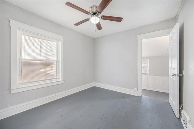 2463 Denver Ave, Kansas City, MO 64127 - empty room featuring hardwood / wood-style floors, a ceiling fan, and ornamental molding