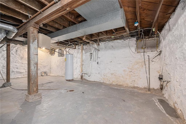 2463 Denver Ave, Kansas City, MO 64127 - unfinished below grade area featuring water heater