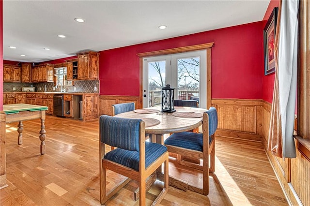 dining space featuring plenty of natural light and light wood-type flooring