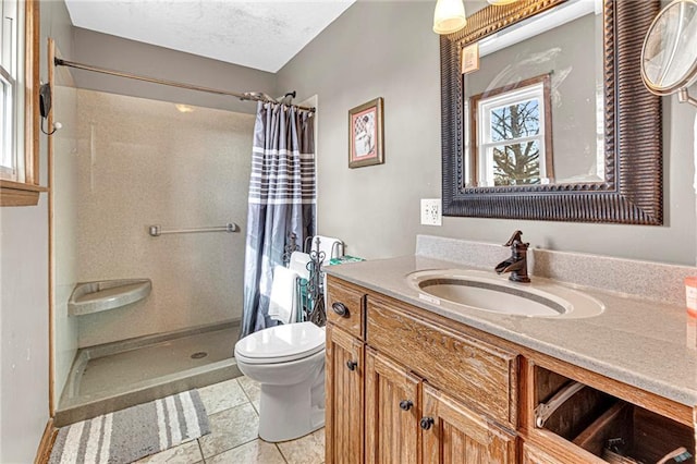 bathroom with vanity, walk in shower, a textured ceiling, and toilet