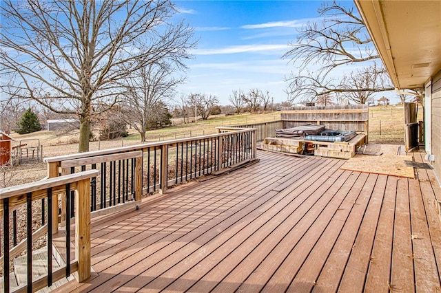 deck featuring a jacuzzi