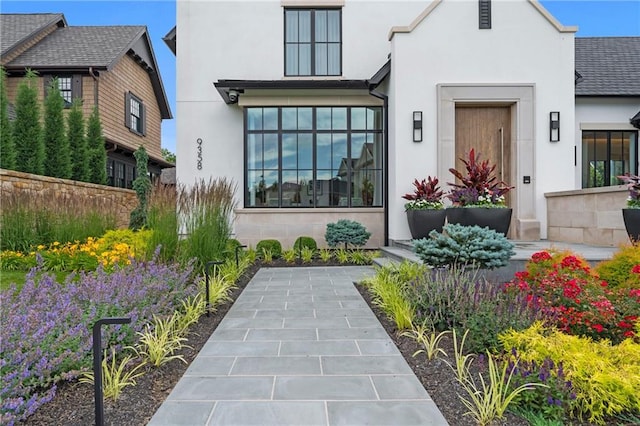 9358 Juniper Reserve Dr, Prairie Village, KS 66207 - view of exterior entry featuring stucco siding