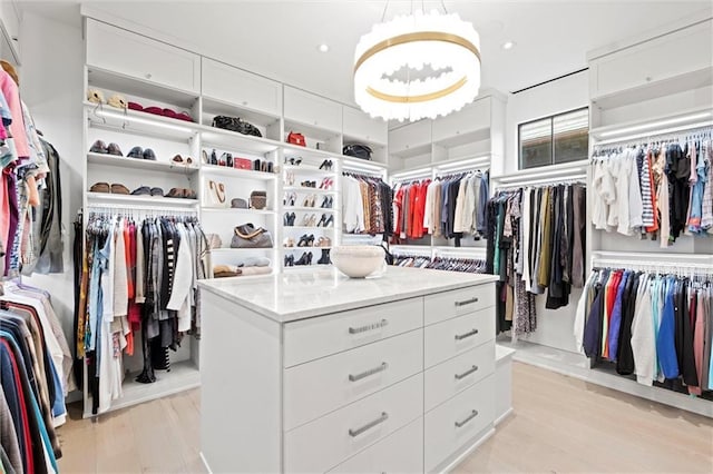 9358 Juniper Reserve Dr, Prairie Village, KS 66207 - spacious closet featuring light wood-style floors