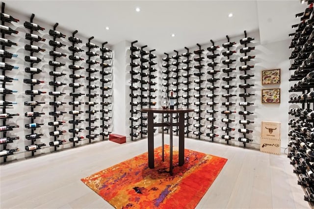 9358 Juniper Reserve Dr, Prairie Village, KS 66207 - wine cellar featuring wood finished floors and recessed lighting