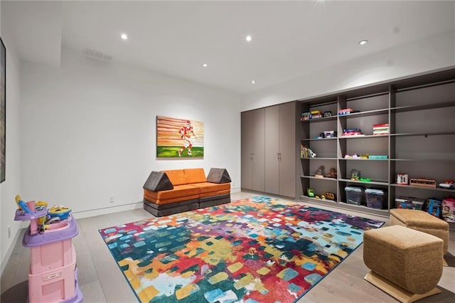 9358 Juniper Reserve Dr, Prairie Village, KS 66207 - playroom featuring wood finished floors and recessed lighting
