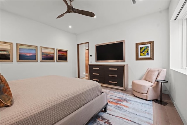 9358 Juniper Reserve Dr, Prairie Village, KS 66207 - bedroom featuring wood finished floors, recessed lighting, and a ceiling fan