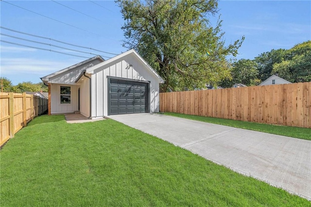 garage with a yard