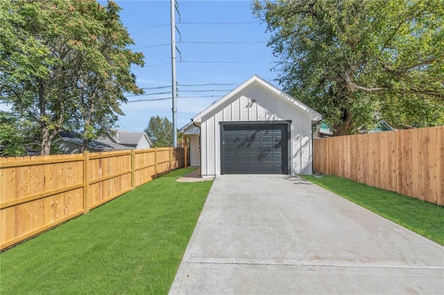 garage featuring a lawn