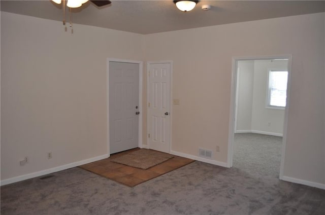 empty room with carpet floors