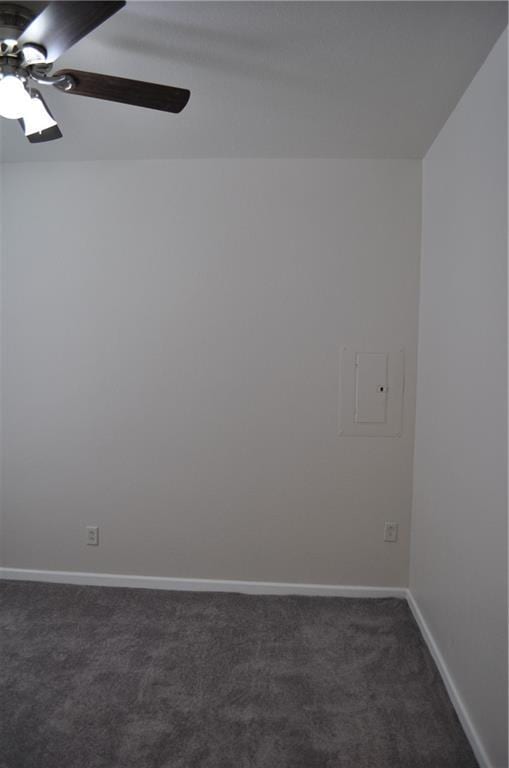 carpeted empty room featuring ceiling fan