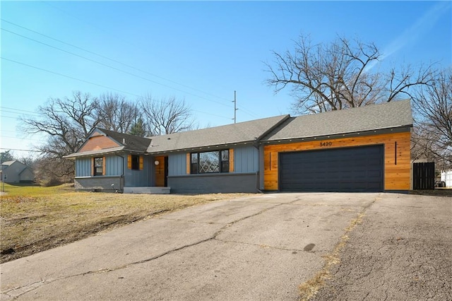 ranch-style home with a garage