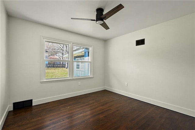 unfurnished room featuring ceiling fan and dark hardwood / wood-style flooring