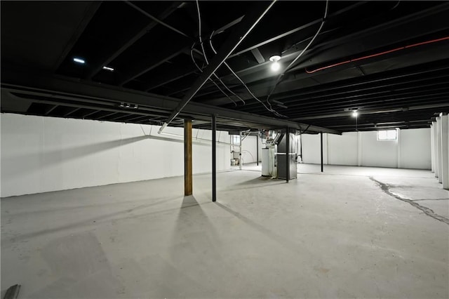 basement featuring heating unit