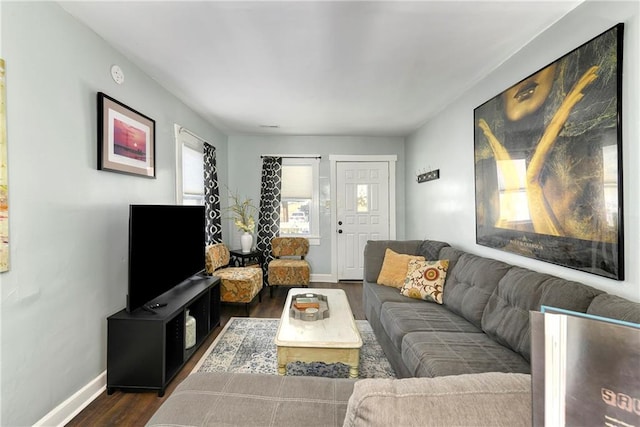 living room featuring dark hardwood / wood-style floors