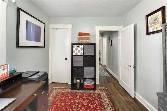 office area with dark hardwood / wood-style flooring