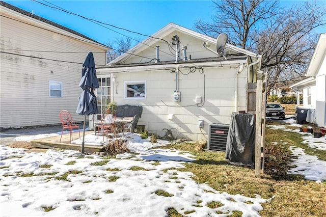 exterior space featuring central AC unit