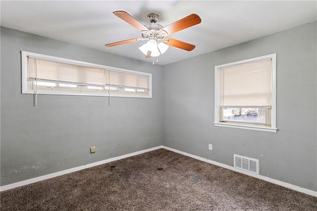 6133 Swope Pkwy, Kansas City, MO 64132 - unfurnished room featuring carpet floors and ceiling fan