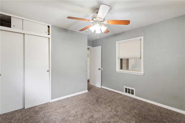 6133 Swope Pkwy, Kansas City, MO 64132 - unfurnished bedroom featuring carpet floors, a closet, and ceiling fan