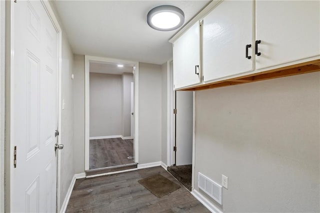 6133 Swope Pkwy, Kansas City, MO 64132 - hall with dark hardwood / wood-style floors