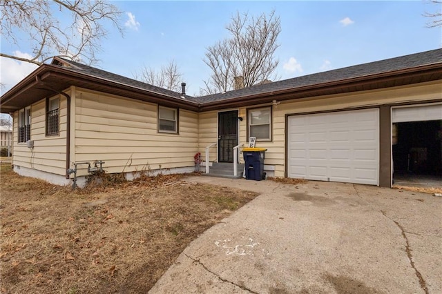 6133 Swope Pkwy, Kansas City, MO 64132 - ranch-style house with a garage