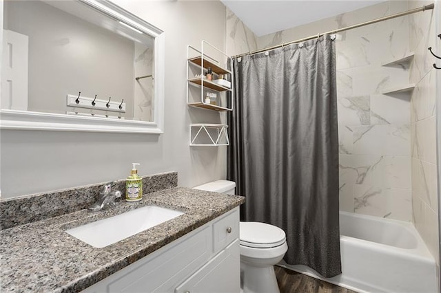 full bath with shower / tub combo with curtain, vanity, toilet, and wood finished floors