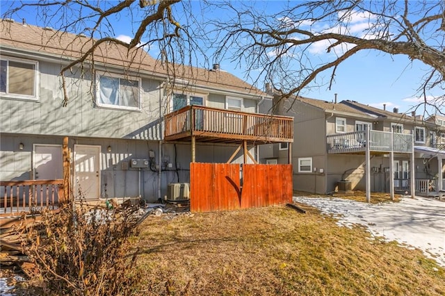 rear view of house with central AC