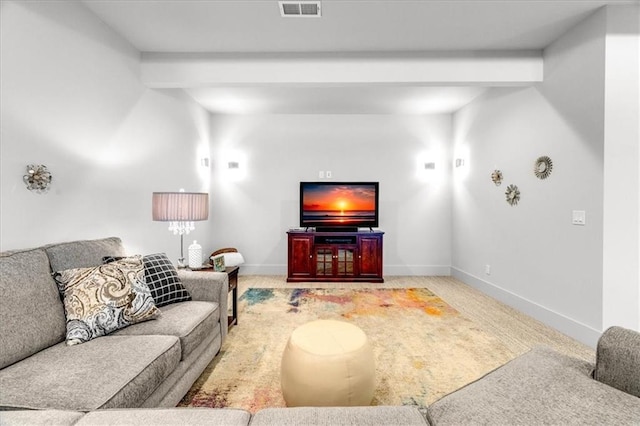 living room with lofted ceiling with beams and carpet flooring