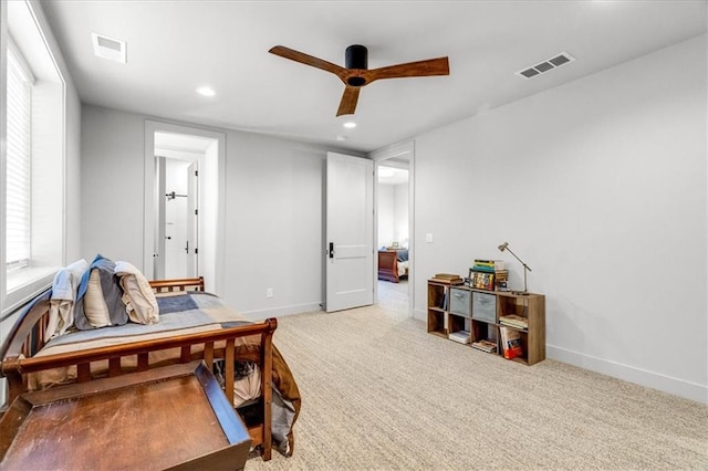 sitting room with light carpet and ceiling fan