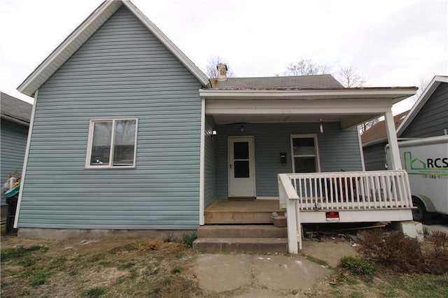 809 S 19th St, Saint Joseph, MO 64507 - rear view of house with a porch