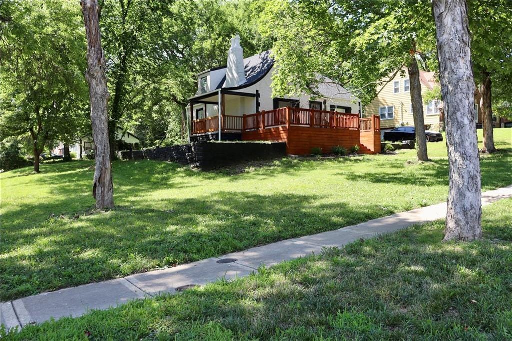 view of yard with a deck