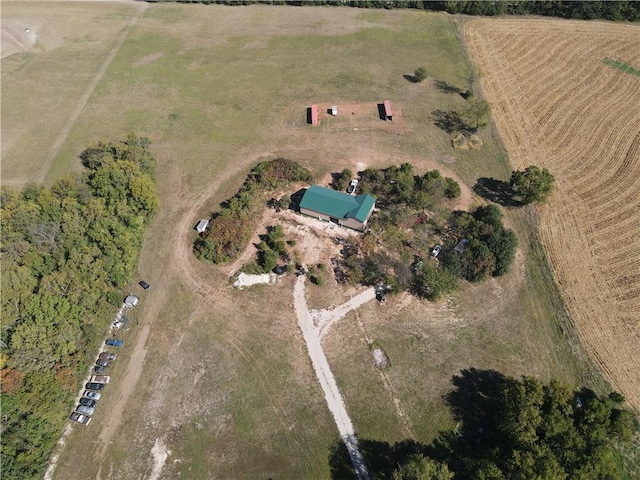 birds eye view of property featuring a rural view