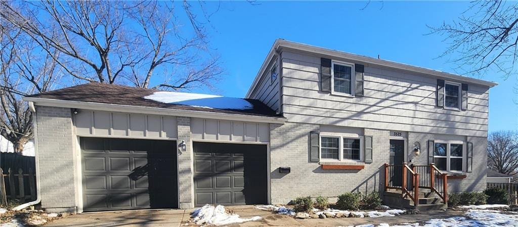 view of front of property with a garage