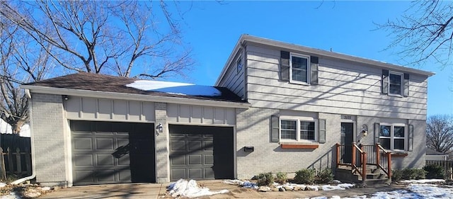 view of front of property with a garage