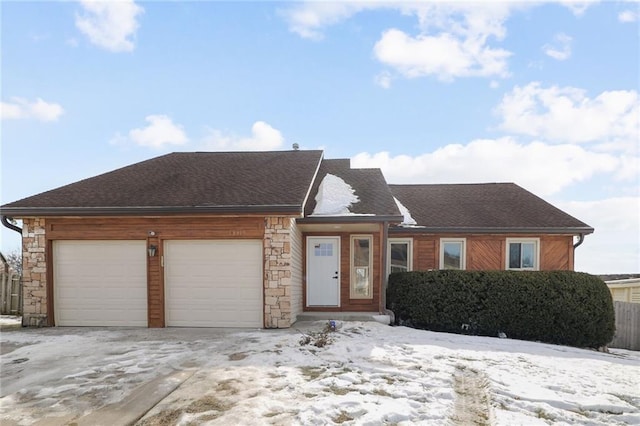 view of front of property with a garage