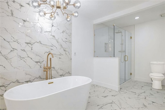 bathroom featuring shower with separate bathtub and toilet