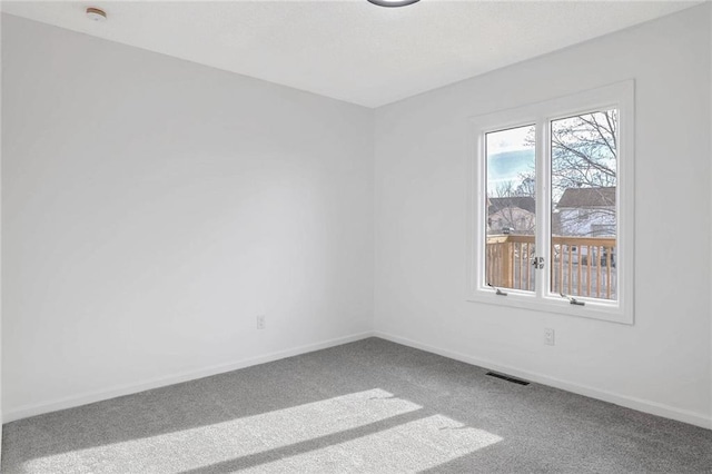 empty room with carpet floors