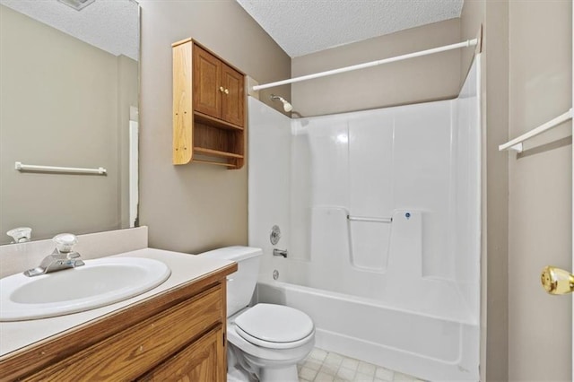 full bathroom featuring shower / bathtub combination, vanity, toilet, and a textured ceiling