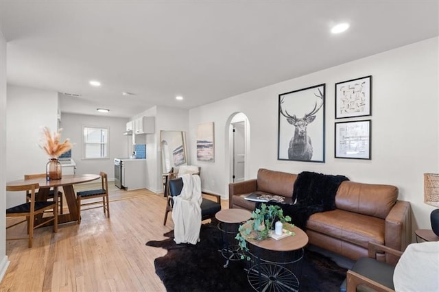 living room with light hardwood / wood-style floors