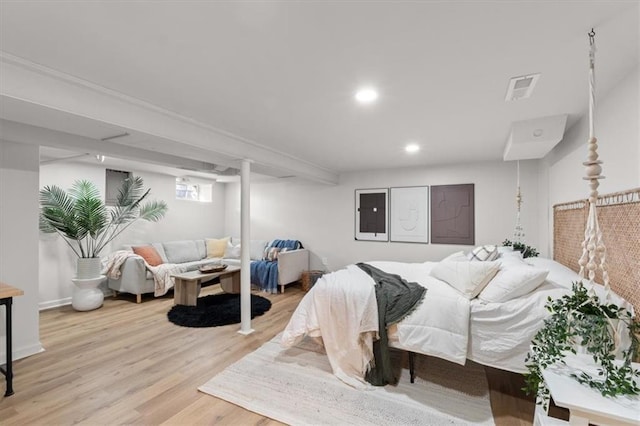 bedroom with light hardwood / wood-style floors