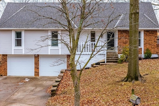 view of front of home with a garage