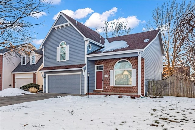 view of front of property featuring a garage