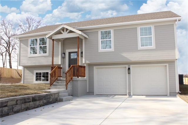 bi-level home featuring a garage