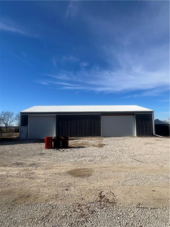 view of outbuilding featuring a garage