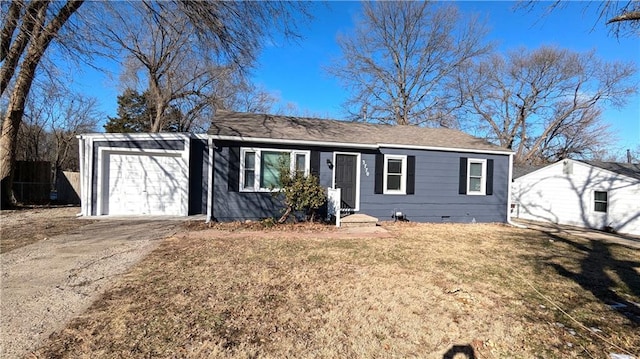 ranch-style house with a garage and a front yard